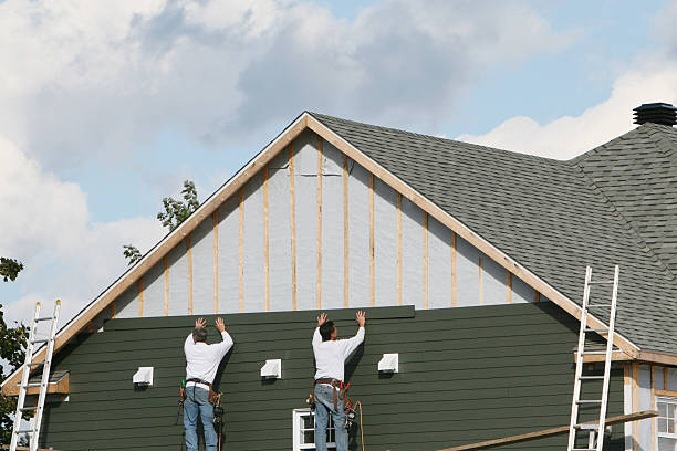 Professional Storm Damage Siding Repair technician working in Mechanicstown, OH